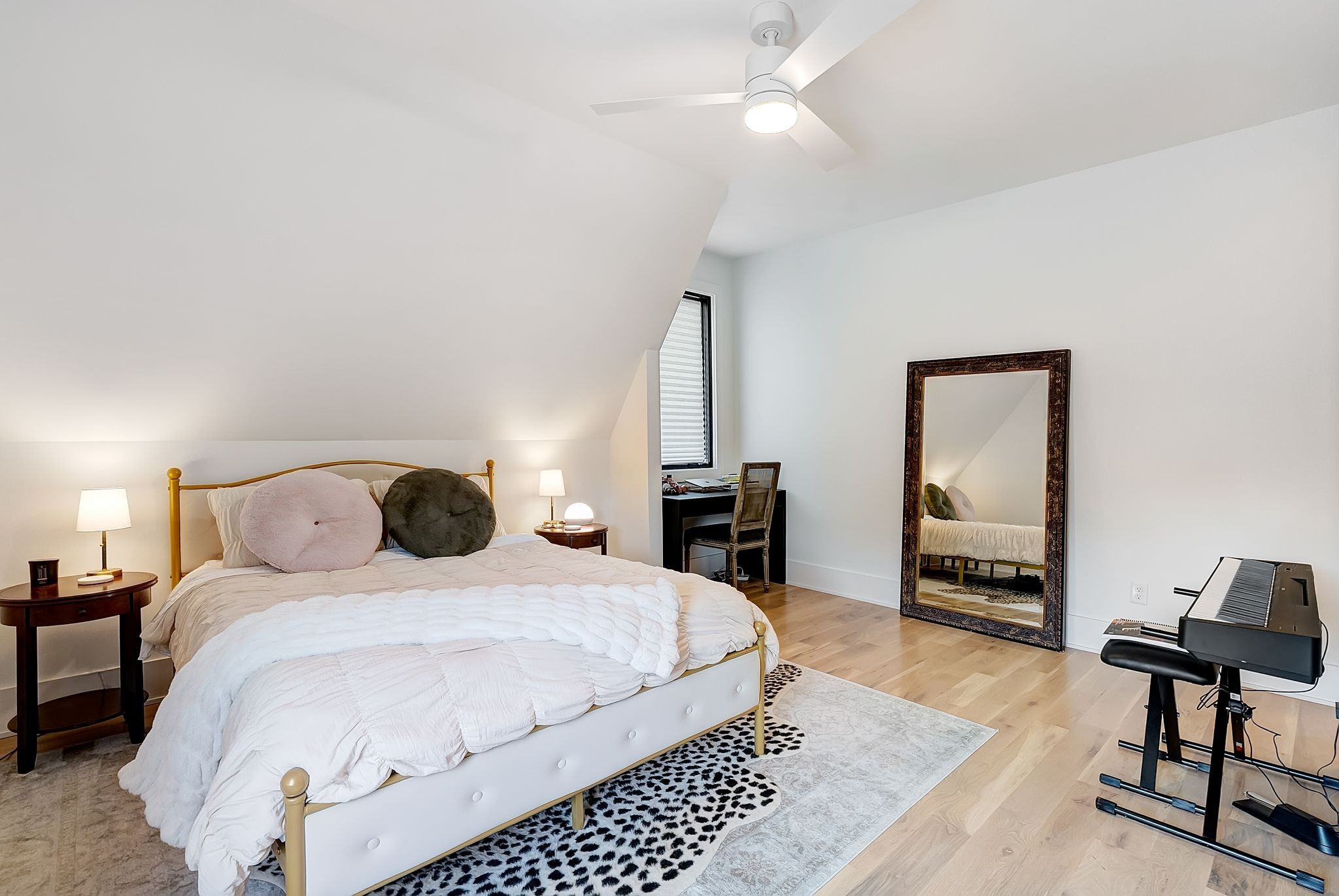 3733 Estes Road Nashville, TN 37215 - Photo 30 of 40 a bedroom with a bed and a chandelier