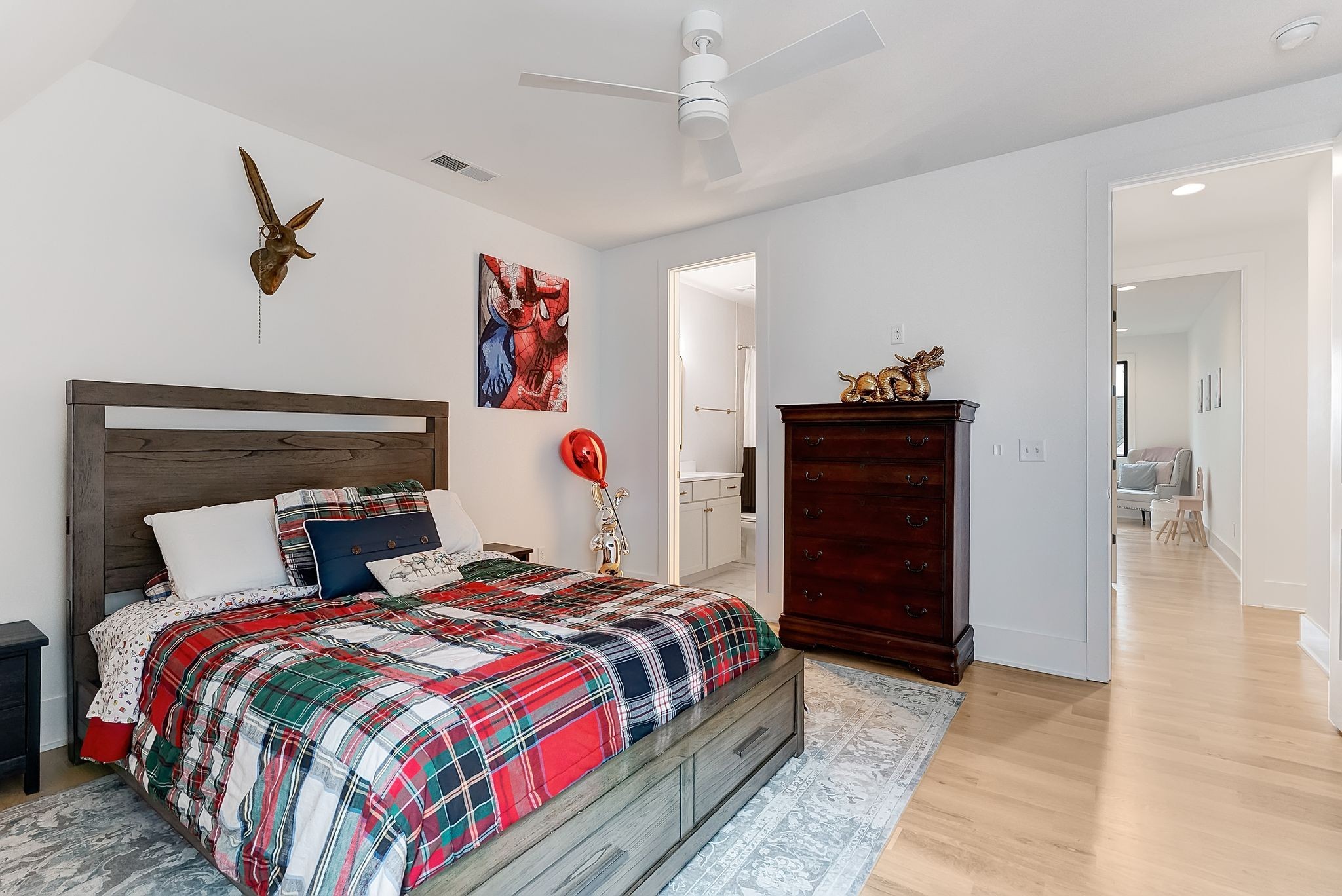 3733 Estes Road Nashville, TN 37215 - Photo 33 of 40 a bedroom with a bed and cabinets