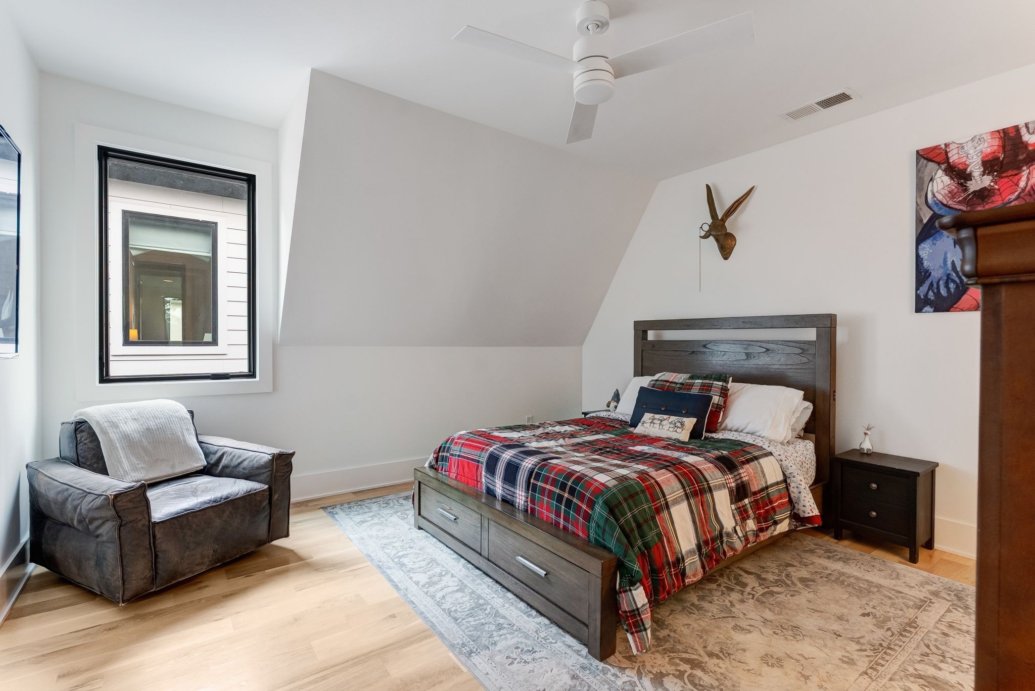 3733 Estes Road Nashville, TN 37215 - Photo 34 of 40 a bedroom with a bed couch and window