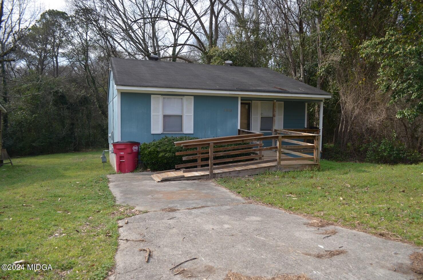 3910 Thompson Road Macon, GA 31204 - Photo 16 of 16 a front view of a house with garden