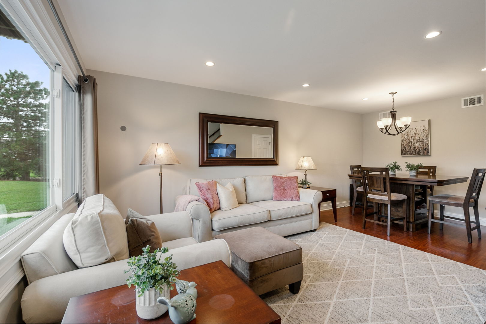17438 Walnut Lane Gurnee, IL 60031 - Photo 4 of 17 a living room with furniture potted plant and a large window