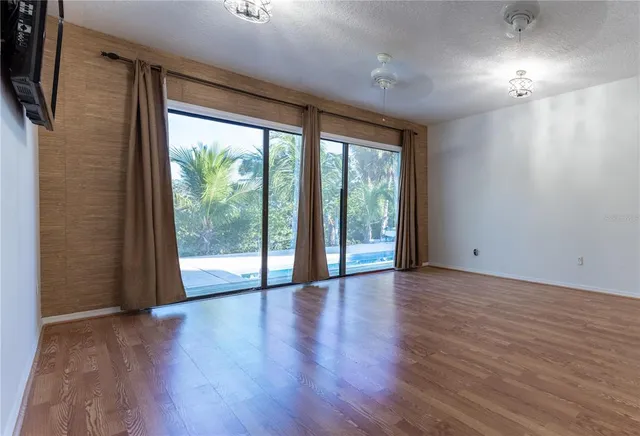 a view of a swimming pool with a patio