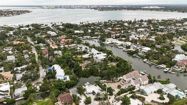 a kitchen with stainless steel appliances granite countertop a refrigerator and a microwave
