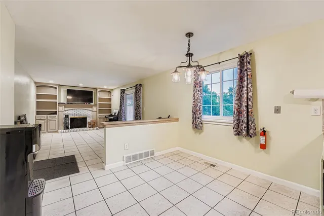 a view of kitchen and windows