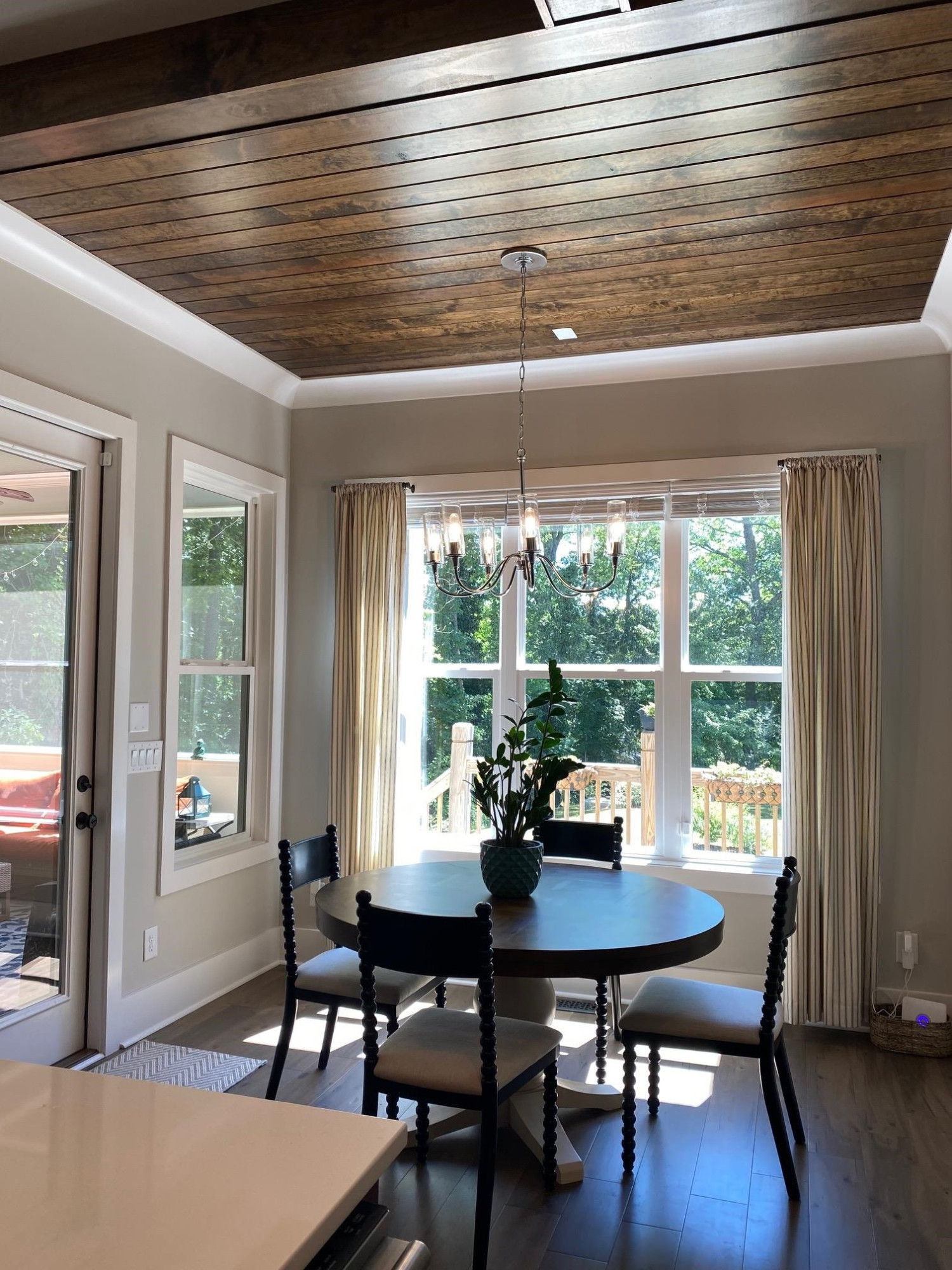 4408 Duraleigh Road Raleigh, NC 27612 - Photo 15 of 21 a view of a dining room with furniture window and outside view