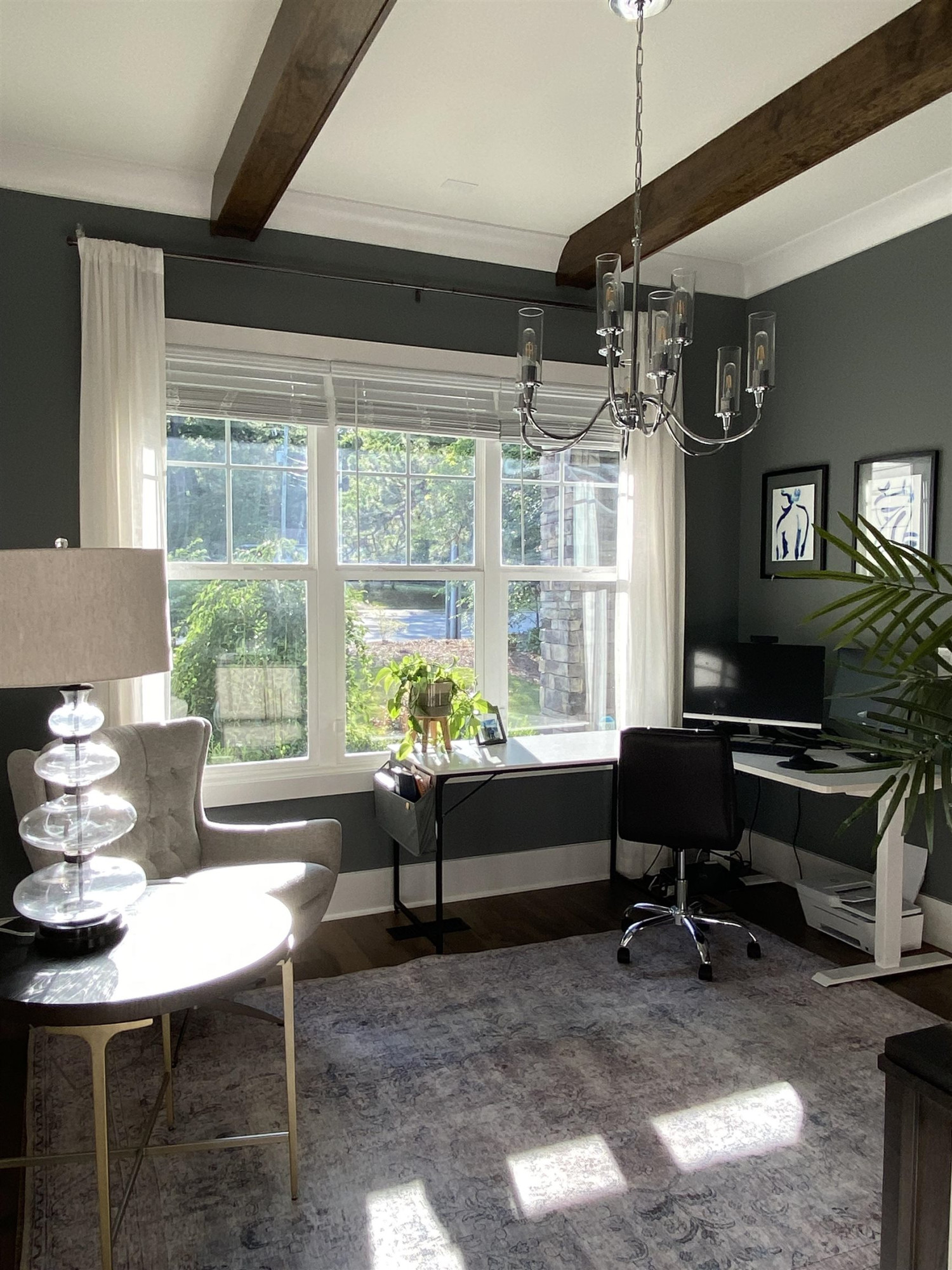 4408 Duraleigh Road Raleigh, NC 27612 - Photo 21 of 21 a living room with furniture and a window