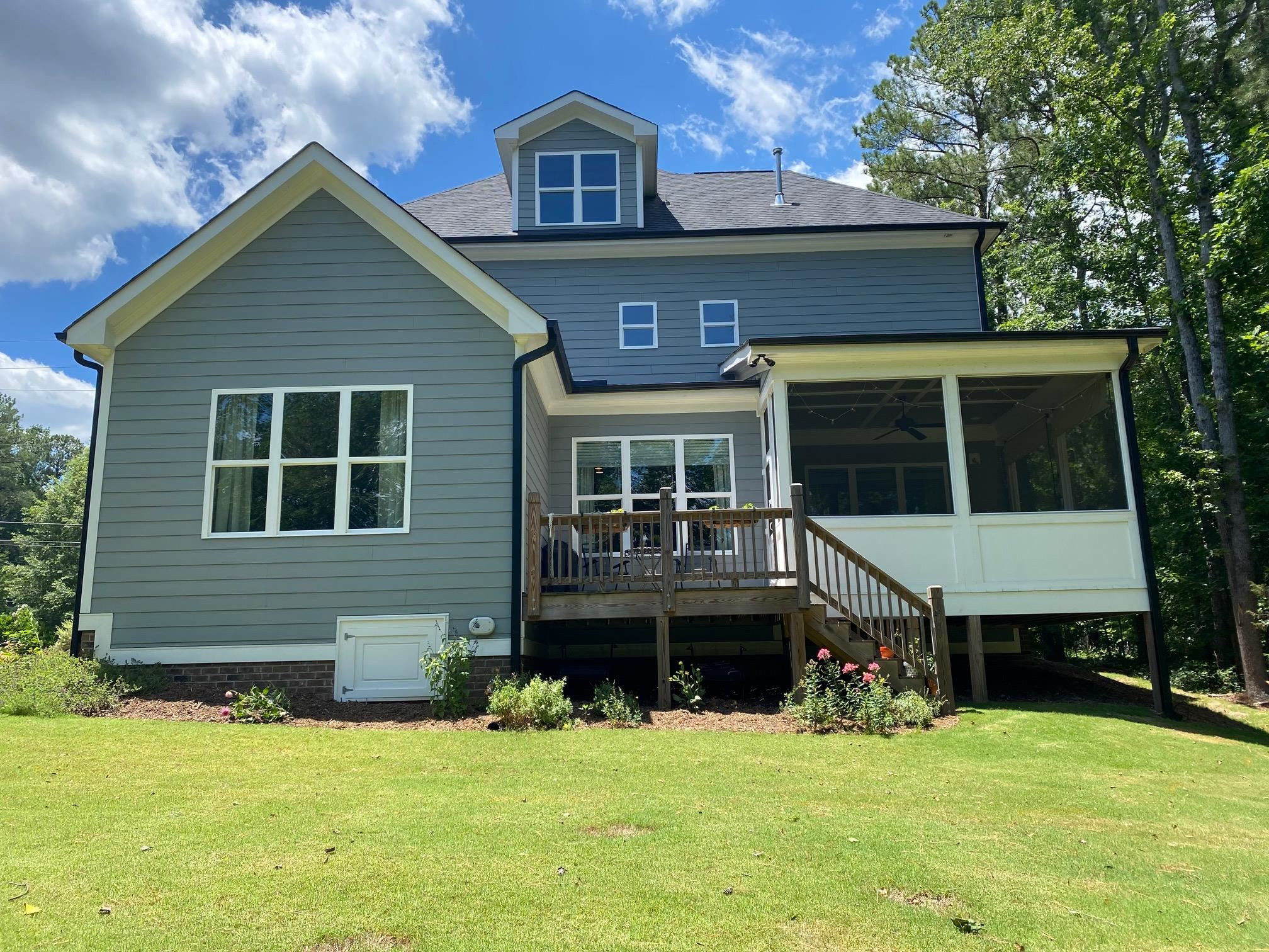 4408 Duraleigh Road Raleigh, NC 27612 - Photo 3 of 21 a front view of a house with a yard