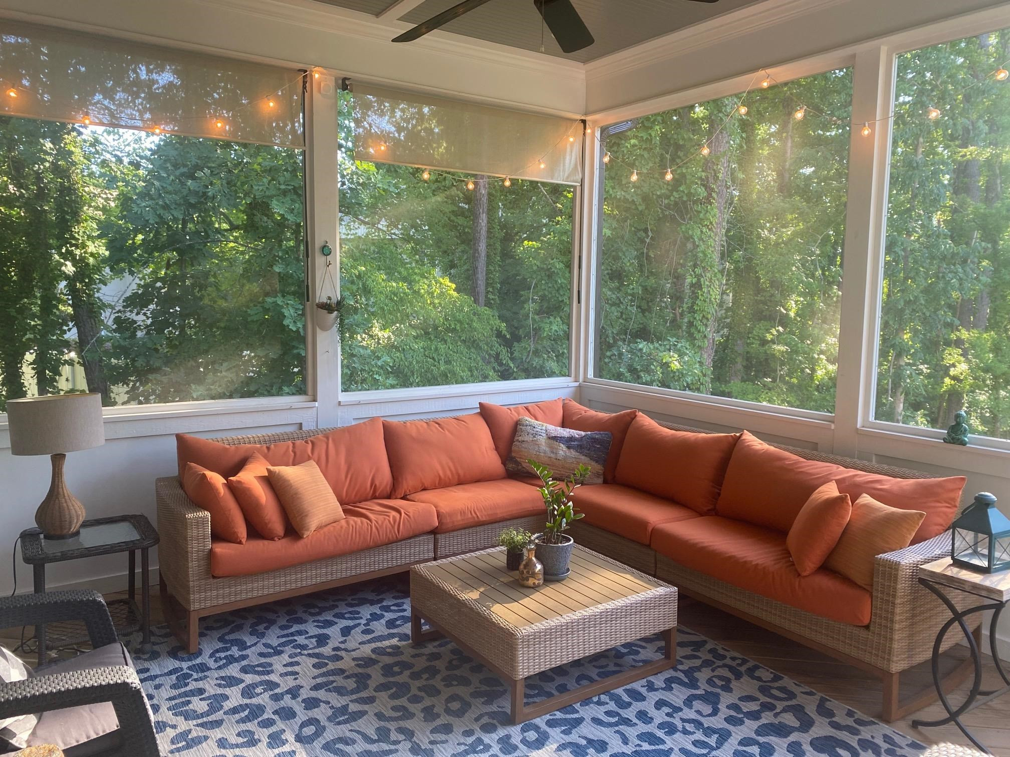 4408 Duraleigh Road Raleigh, NC 27612 - Photo 4 of 21 a living room with furniture and a floor to ceiling window