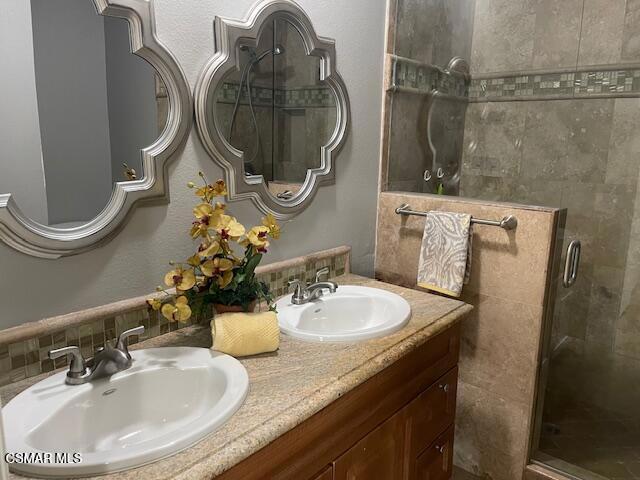 1256 Patricia Avenue, Unit 10 Simi Valley, CA 93065 - Photo 12 of 25 a bathroom with a sink and a mirror