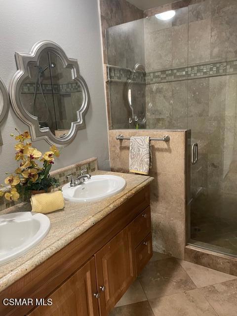 1256 Patricia Avenue, Unit 10 Simi Valley, CA 93065 - Photo 13 of 25 a bathroom with a sink and a mirror