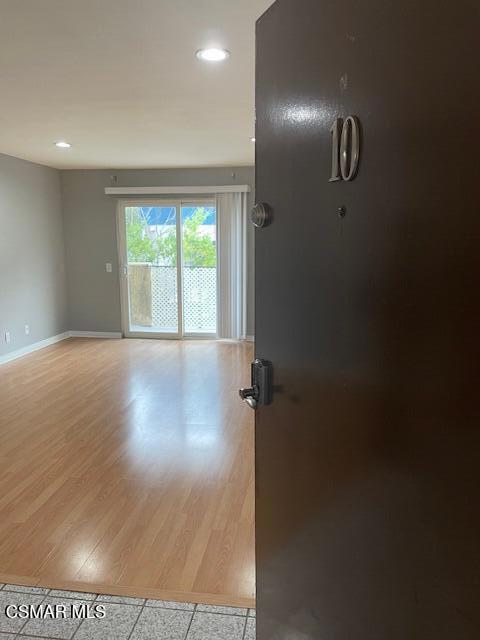 1256 Patricia Avenue, Unit 10 Simi Valley, CA 93065 - Photo 23 of 25 a view of empty room with wooden floor and fan