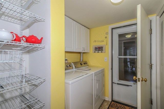 302 Locksley Drive Streamwood, IL 60107 - Photo 11 of 23 a utility room with a sink washer and dryer