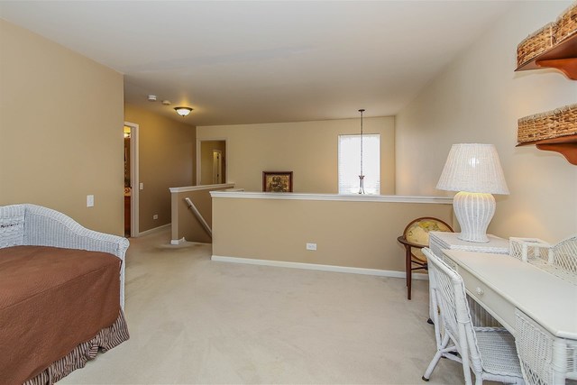 302 Locksley Drive Streamwood, IL 60107 - Photo 15 of 23 a workspace with furniture and window