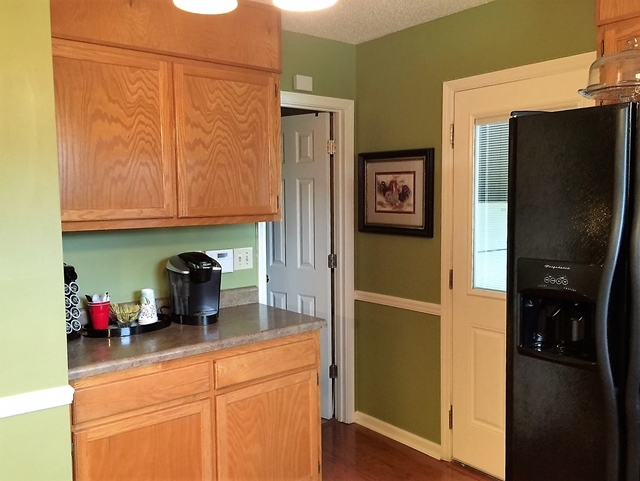 4967 Fulton Mill Road Macon, GA 31216 - Photo 11 of 28 a kitchen with stainless steel appliances granite countertop a refrigerator and a sink