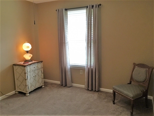 4967 Fulton Mill Road Macon, GA 31216 - Photo 19 of 28 a living room with furniture and a window