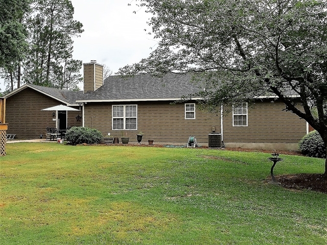 4967 Fulton Mill Road Macon, GA 31216 - Photo 25 of 28 a house view with a garden space
