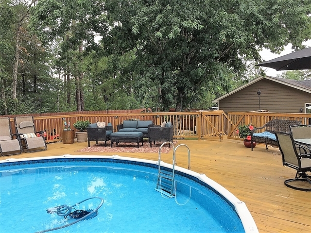 4967 Fulton Mill Road Macon, GA 31216 - Photo 28 of 28 a view of a swimming pool with a patio