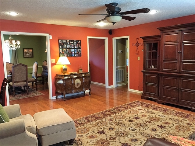 4967 Fulton Mill Road Macon, GA 31216 - Photo 5 of 28 a living room with furniture and a flat screen tv