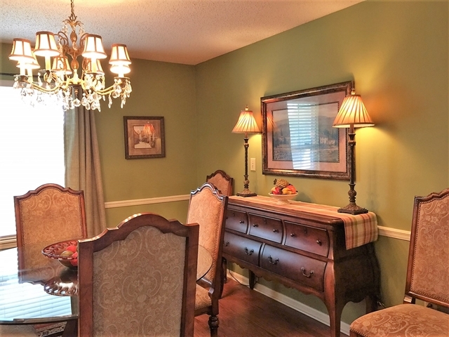 4967 Fulton Mill Road Macon, GA 31216 - Photo 8 of 28 a dining room with furniture and chandelier