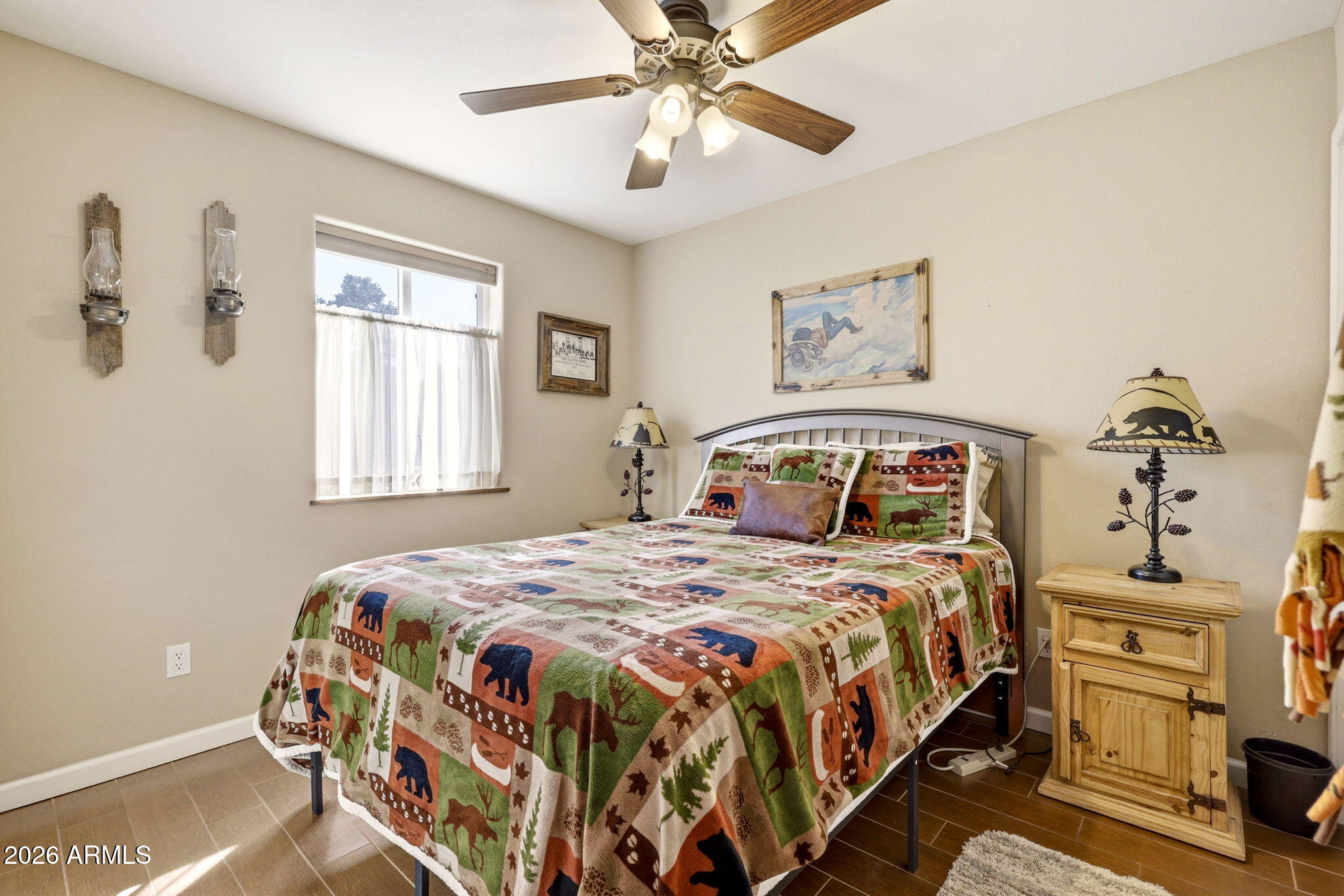 2112 Fishermans Road Overgaard, AZ 85933 - Photo 9 of 18 a bedroom with a bed and window