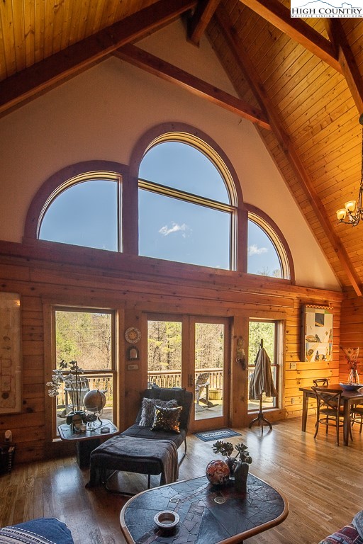 154 Lilac Lane Boone, NC 28607 - Photo 11 of 50 a living room with furniture and a large window