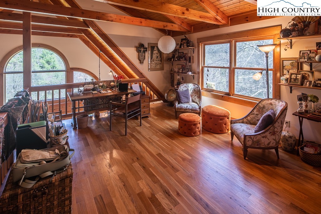 154 Lilac Lane Boone, NC 28607 - Photo 29 of 50 a outdoor space with lots of furniture and wooden floor