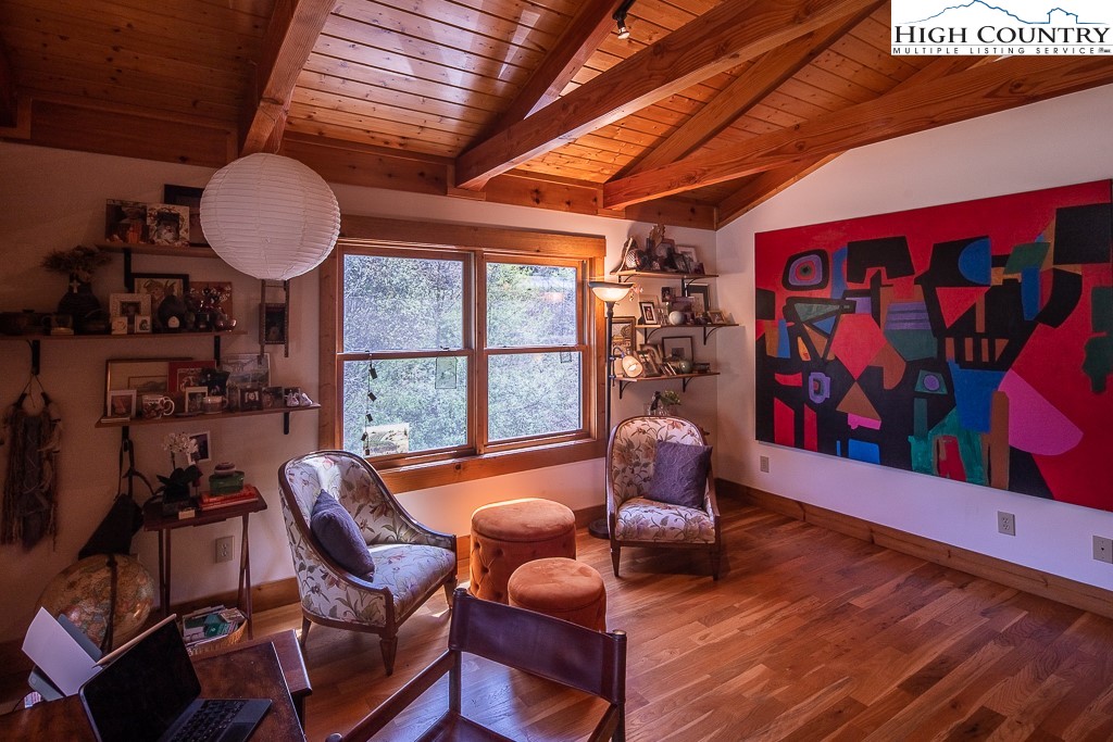 154 Lilac Lane Boone, NC 28607 - Photo 30 of 50 a living room with furniture and a window
