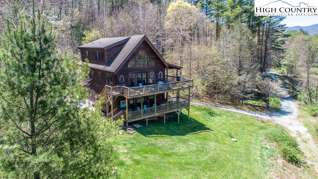 154 Lilac Lane Boone, NC 28607 - Photo 3 of 50 an aerial view of a house with a yard