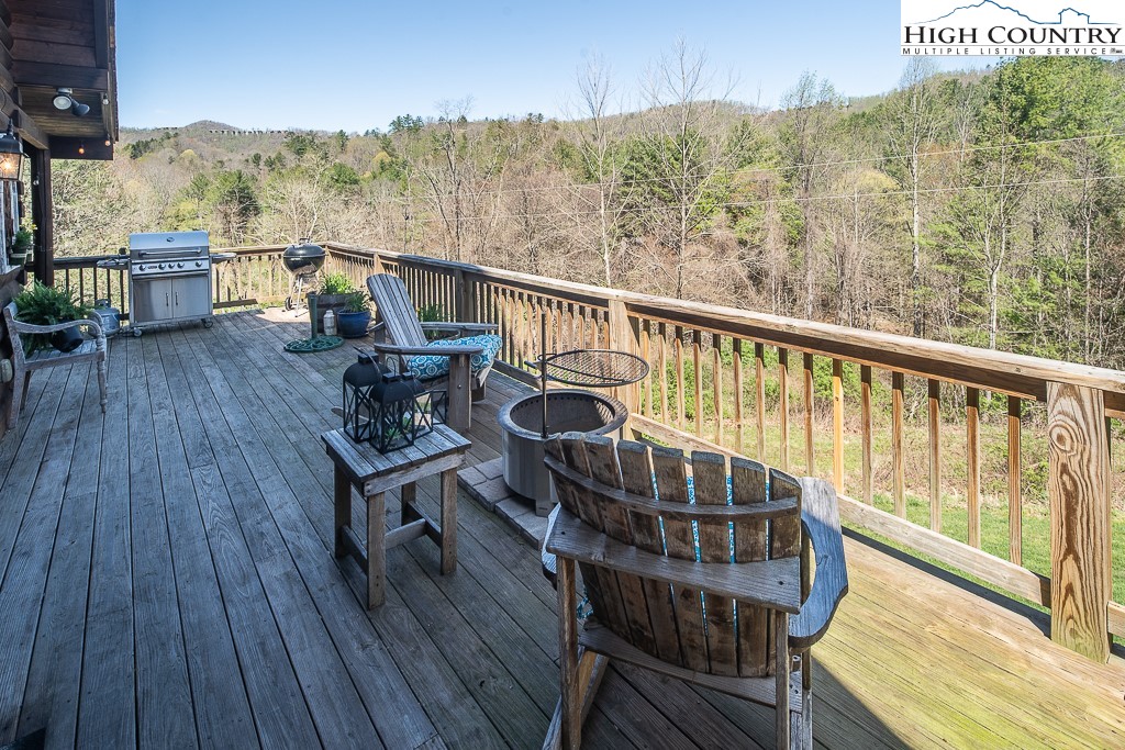 154 Lilac Lane Boone, NC 28607 - Photo 4 of 50 a view of a balcony with furniture