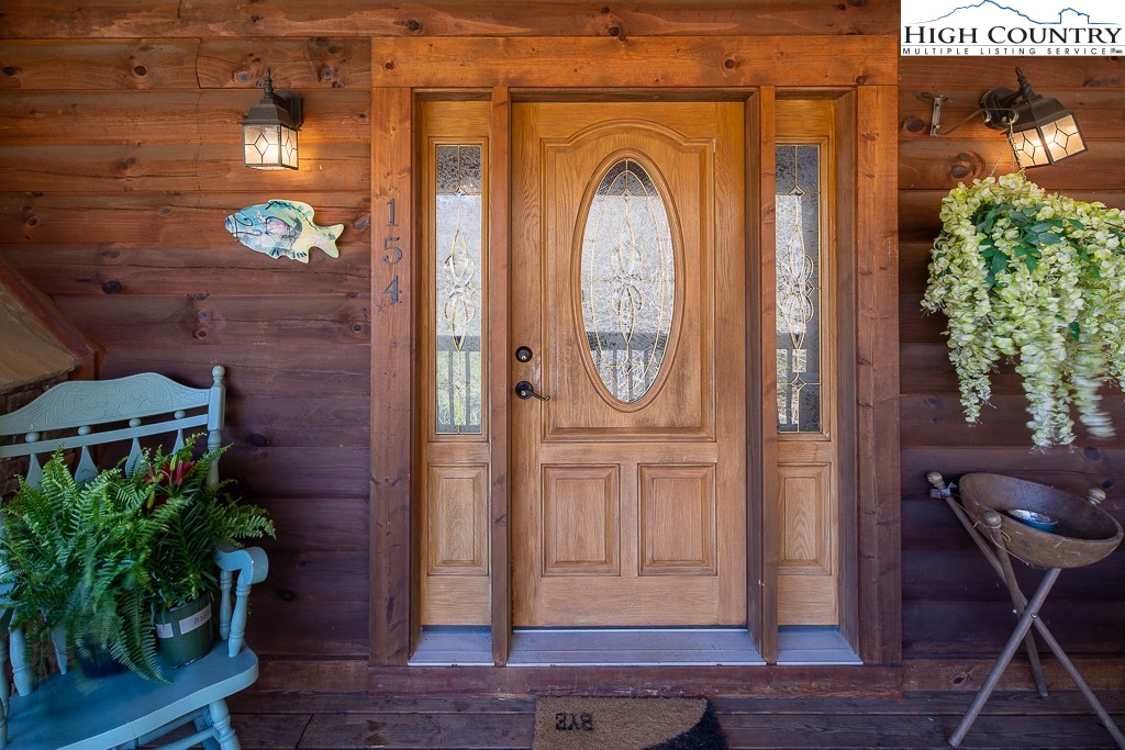 154 Lilac Lane Boone, NC 28607 - Photo 8 of 50 a view of entryway with wooden floor