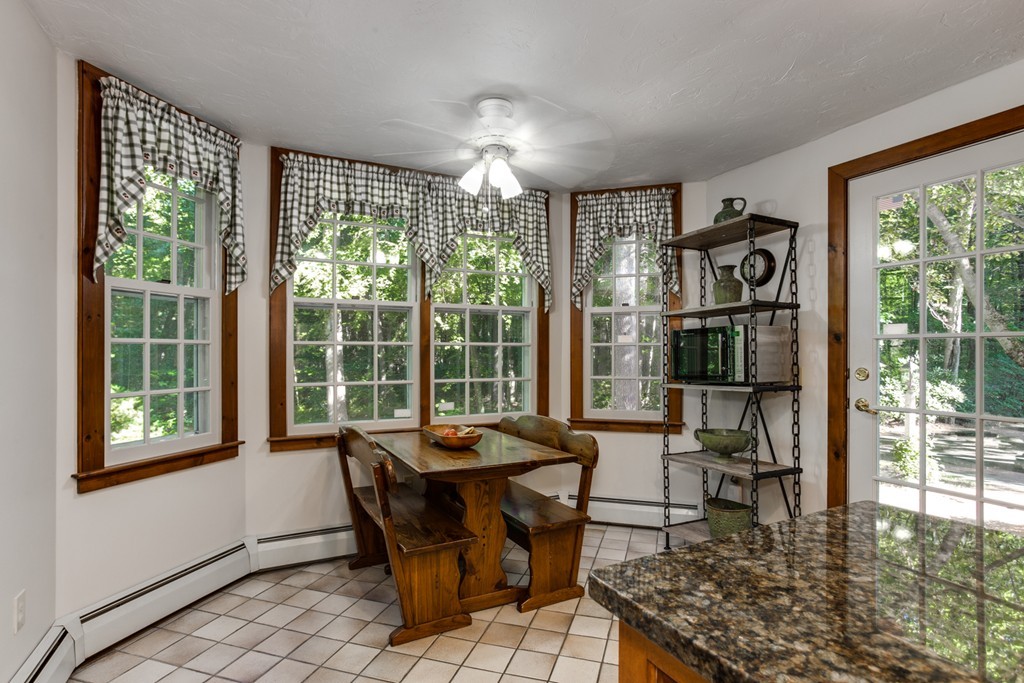 86 Houghton Road Princeton, MA 01541 - Photo 5 of 30 a living room with furniture and a floor to ceiling window