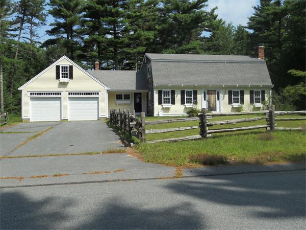 18 Randall Road Rochester, MA 02770 - Photo 1 of 17 front view of house with a yard
