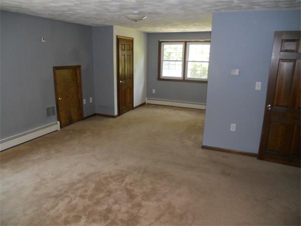 18 Randall Road Rochester, MA 02770 - Photo 7 of 17 an empty room with windows