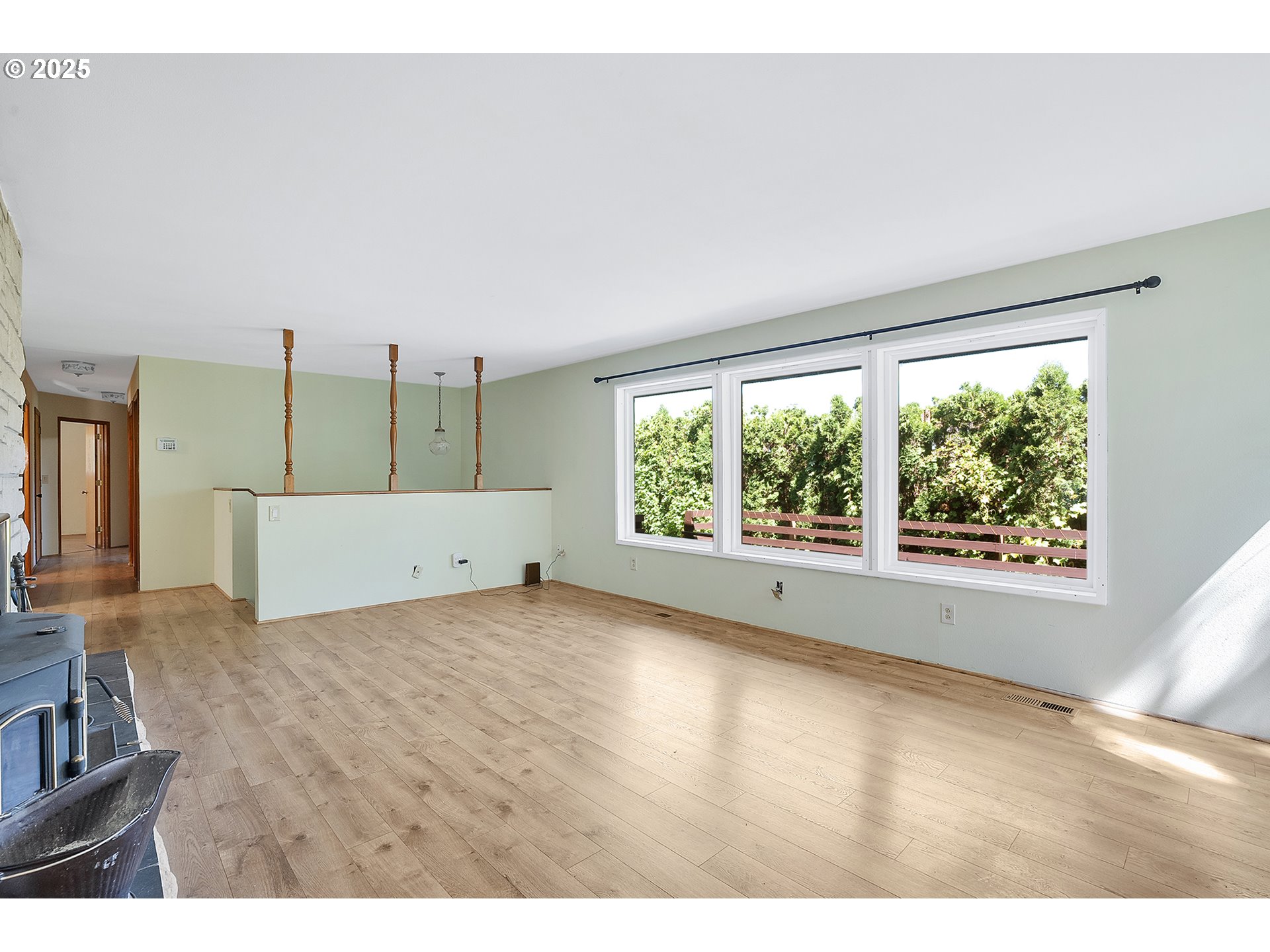 701 Northeast Evans Road Corbett, OR 97019 - Photo 11 of 48 a living room with furniture and a large window