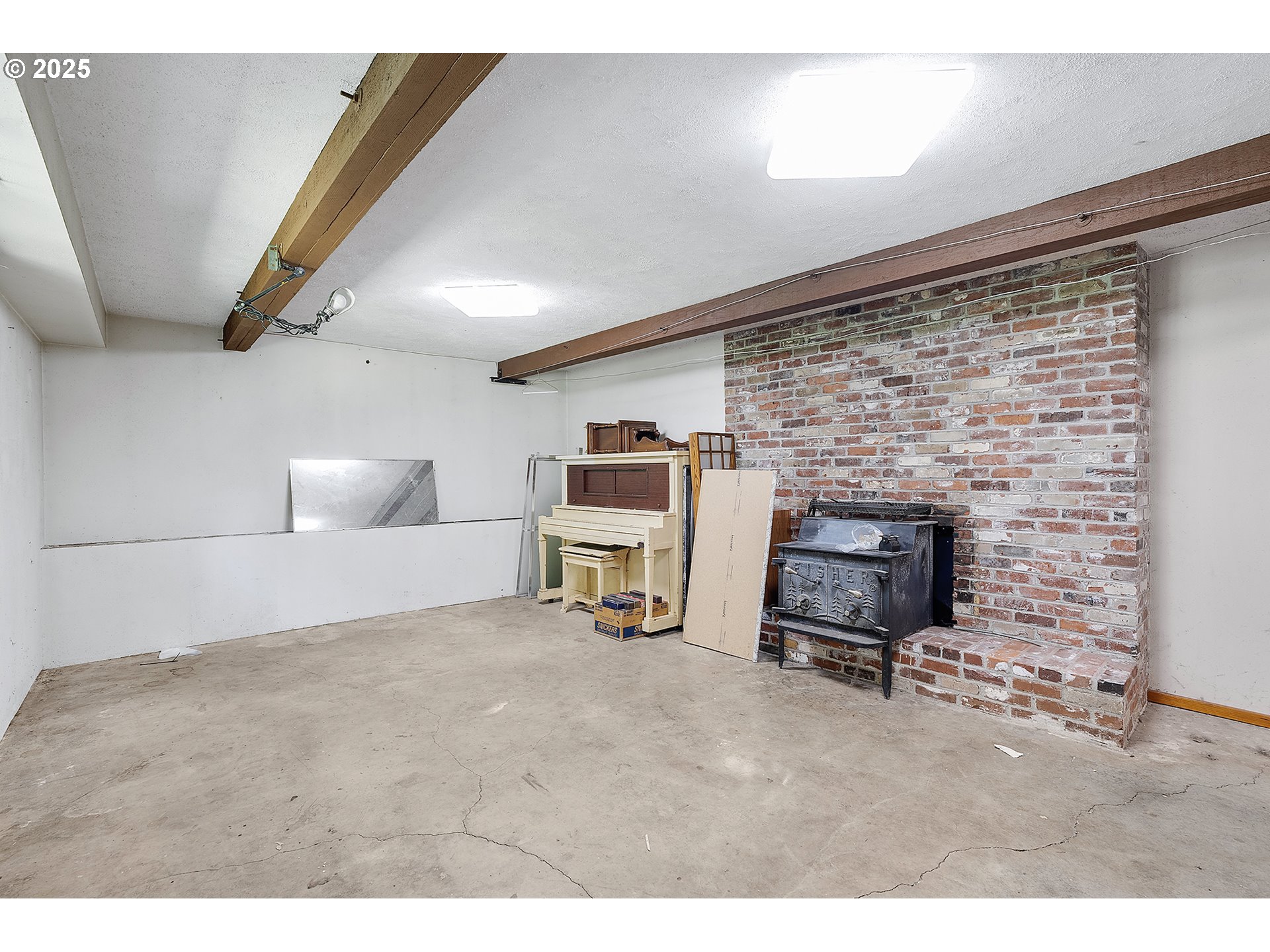 701 Northeast Evans Road Corbett, OR 97019 - Photo 30 of 48 a living room with furniture and a fireplace