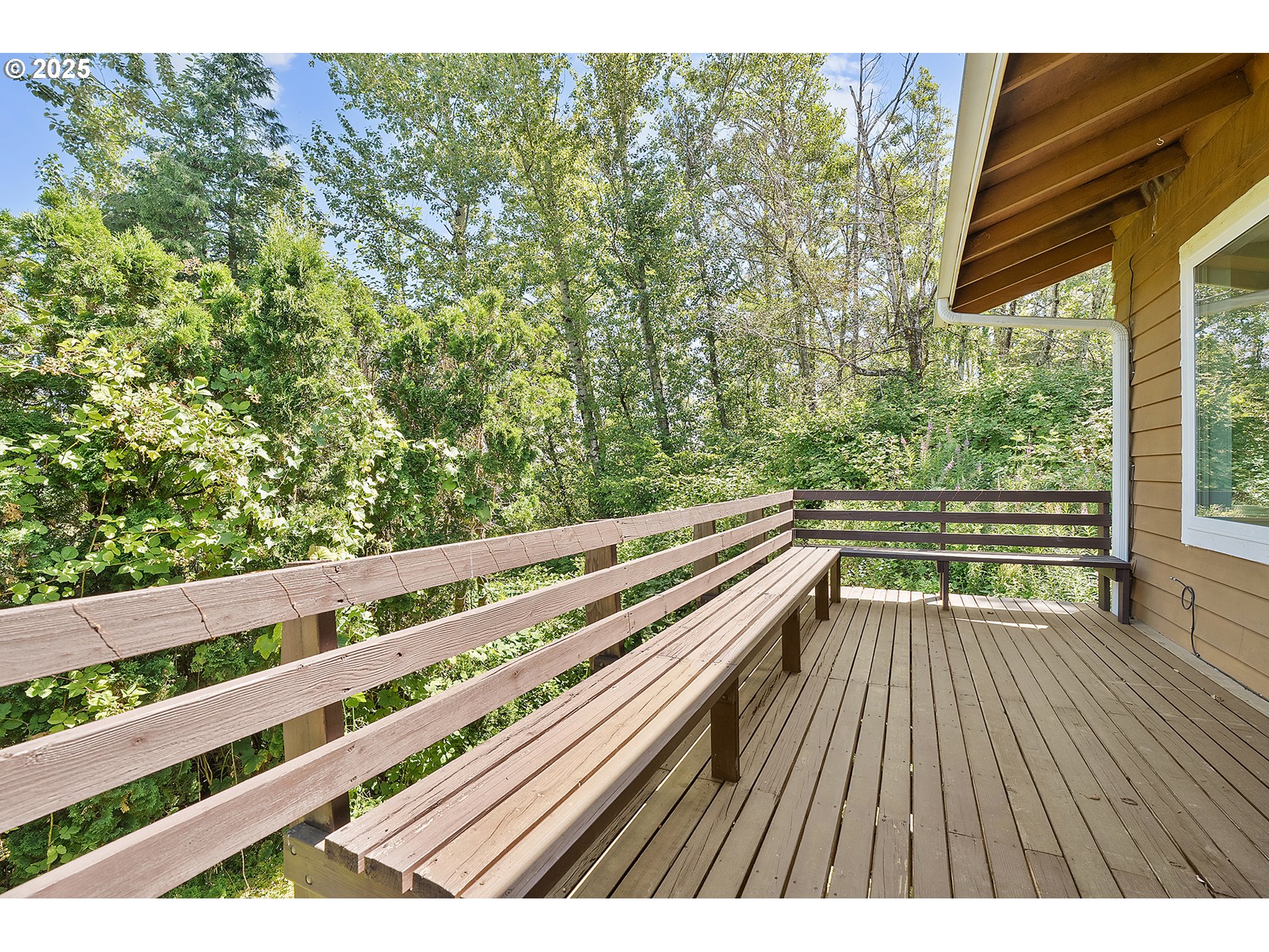 701 Northeast Evans Road Corbett, OR 97019 - Photo 6 of 48 a view of balcony with wooden floor and fence