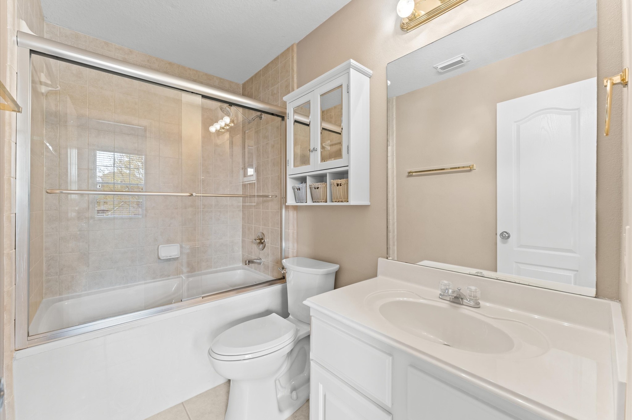 2411 Clippers Square Houston, TX 77058 - Photo 18 of 25 a bathroom with a sink toilet and shower