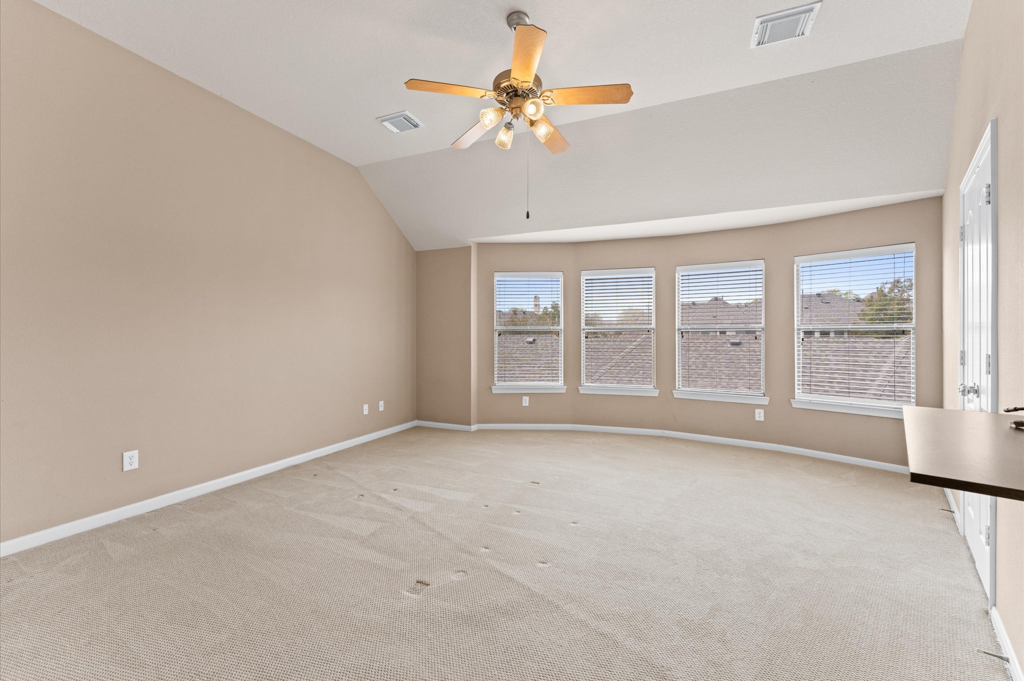 2411 Clippers Square Houston, TX 77058 - Photo 19 of 25 a view of an empty room with a window