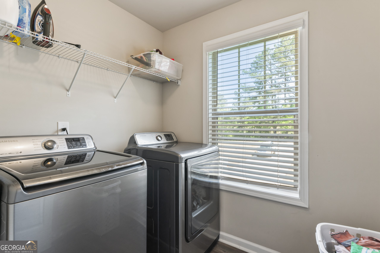 643 Patillo Road Stockbridge, GA 30281 - Photo 17 of 30 a utility room with dryer and washer