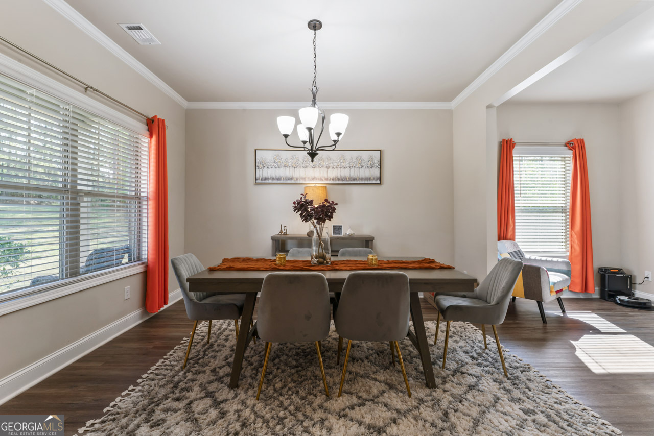 643 Patillo Road Stockbridge, GA 30281 - Photo 7 of 30 a view of a dining room with furniture window and outside view