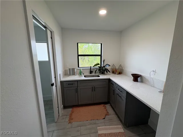 a bathroom with a toilet and a sink