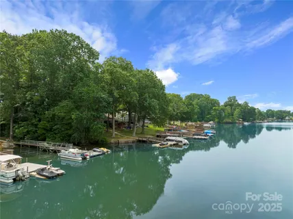 a view of lake with green space