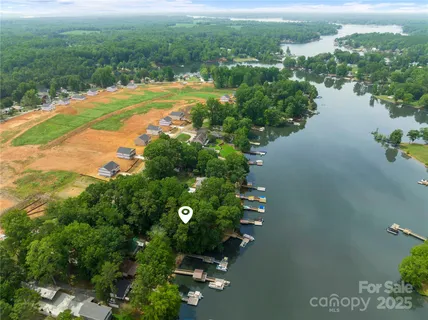 a view of a lake with a yard