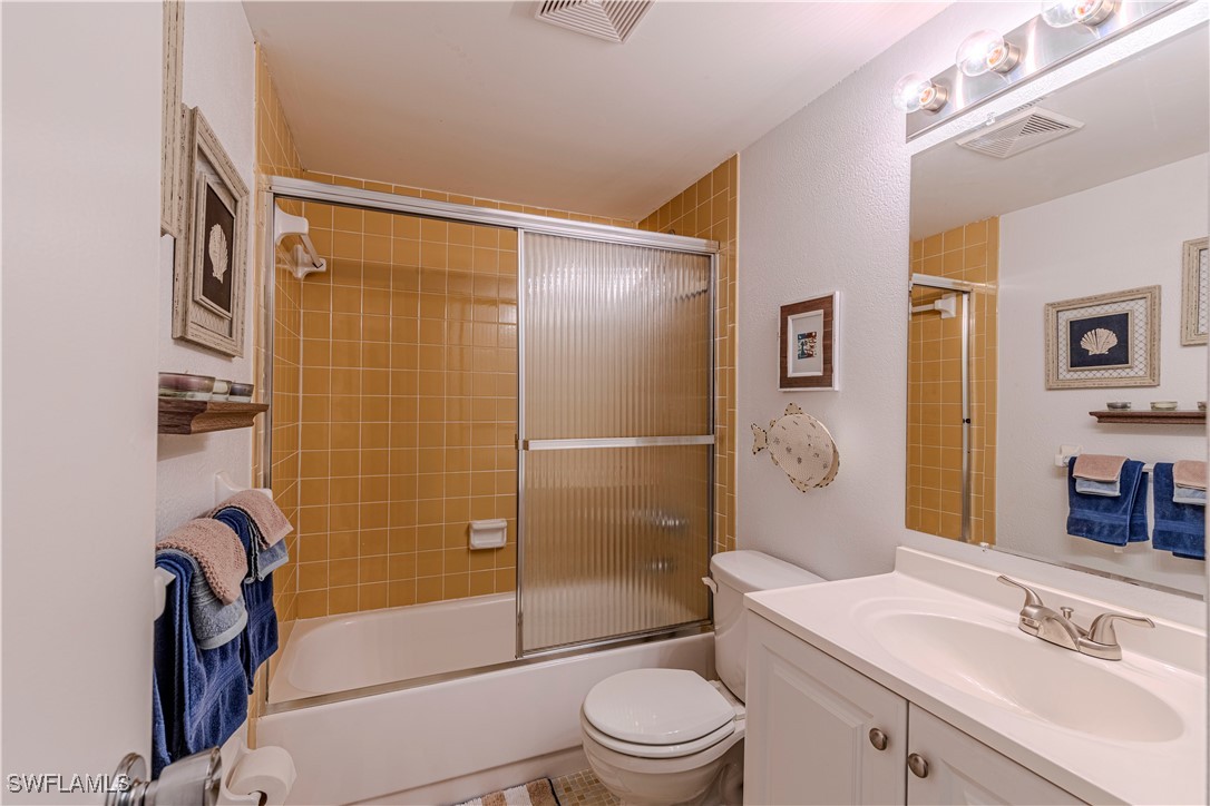 7043 New Post Road, Unit 7 North Fort Myers, FL 33917 - Photo 17 of 26 a bathroom with a sink toilet and shower