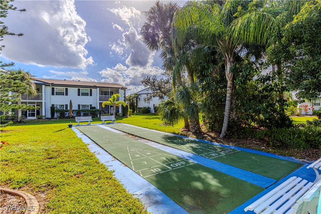 7043 New Post Road, Unit 7 North Fort Myers, FL 33917 - Photo 5 of 26 a view of swimming pool is middle in the garden