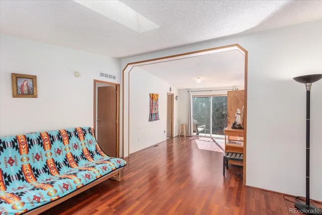 a hallway with wooden floor