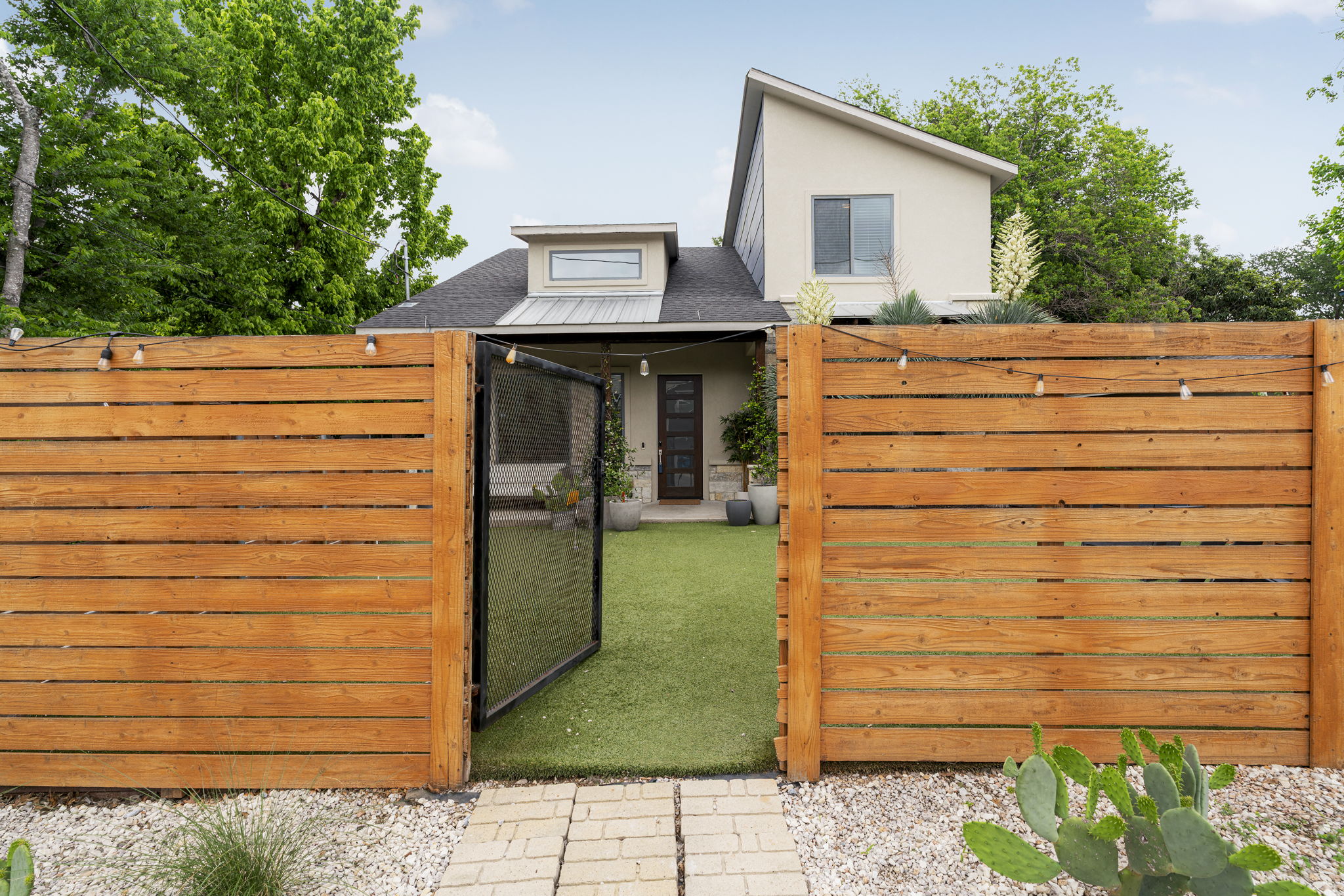 5204 Samuel Huston Avenue Austin, TX 78721 - Photo 7 of 38 Private gate entry