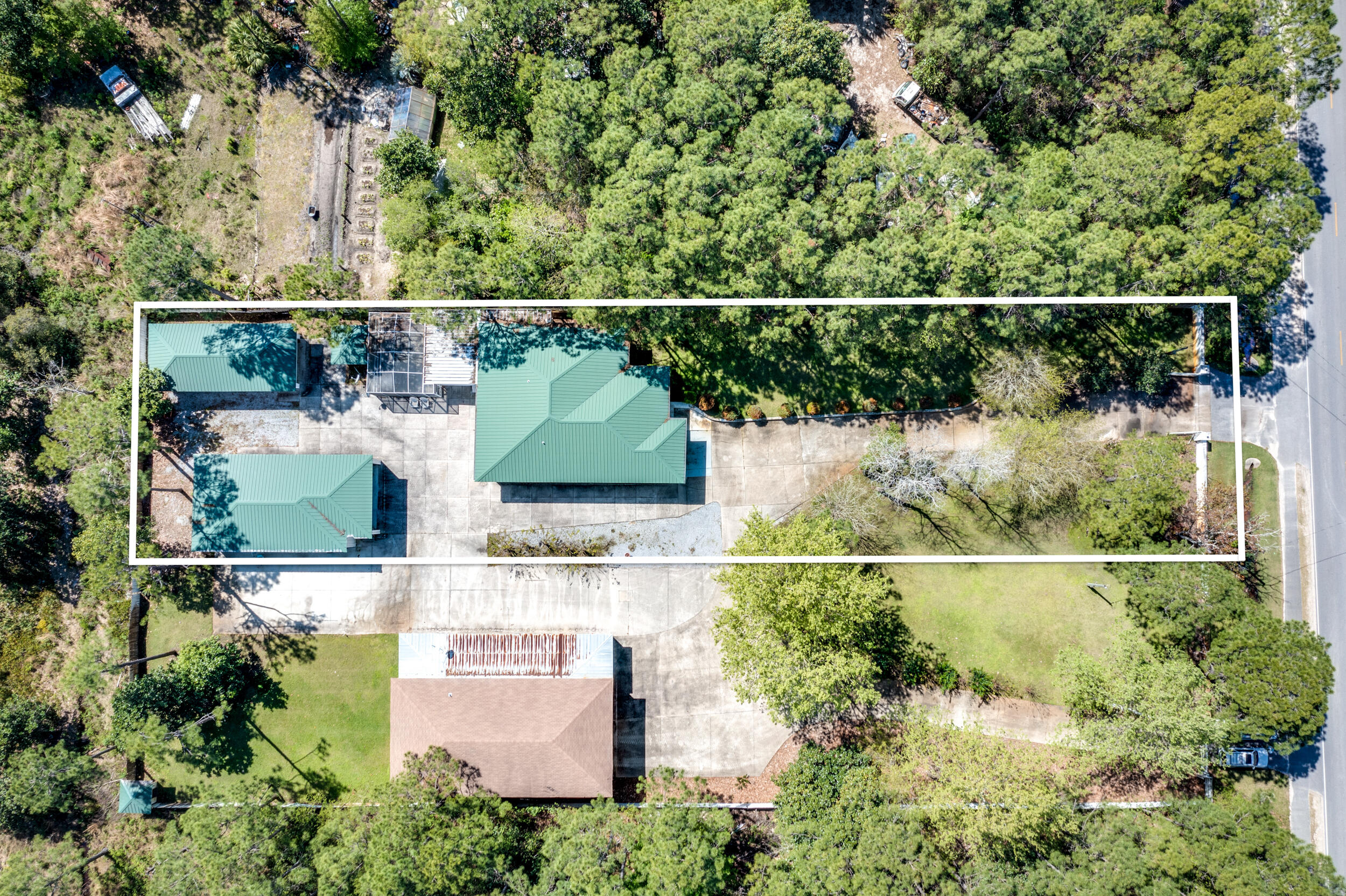 an aerial view of houses with yard