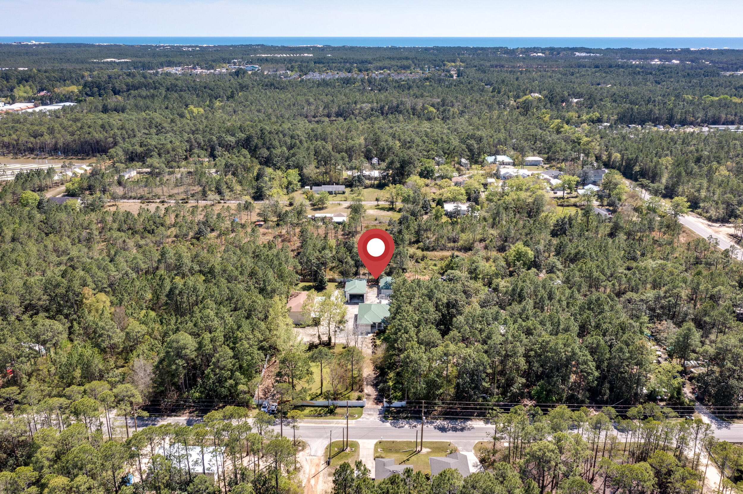 389 Churchill Bayou Road Santa Rosa Beach, FL 32459 - Photo 26 of 38 a view of a city