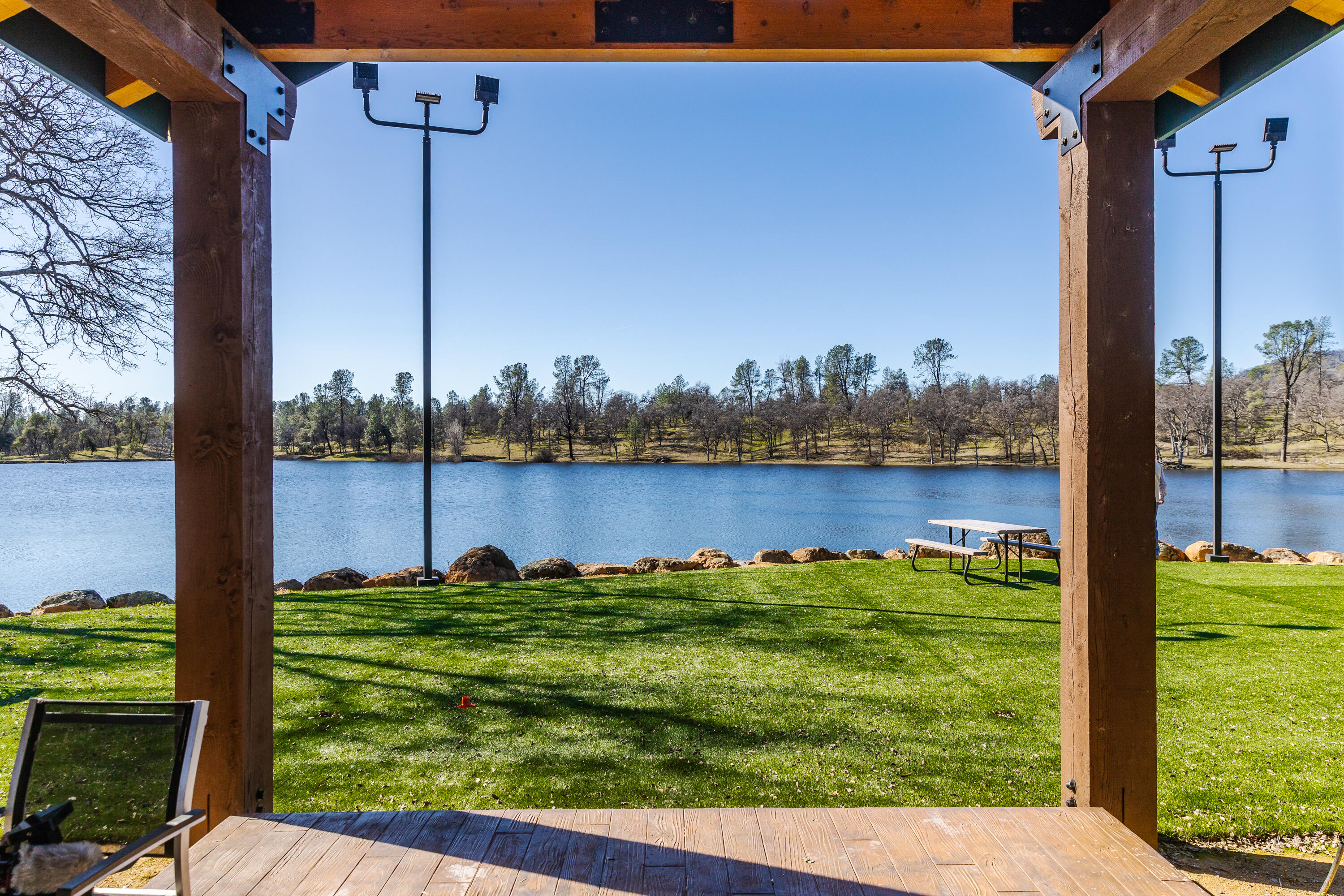 8499 Simmons Road Redding, CA 96001 - Photo 30 of 38 a view of a garden with lawn chairs